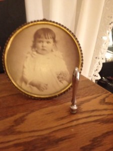 My grandmother, c. 1905, and her phone dialer.